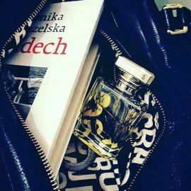 my wife's fave perfume, fave bag, and fave book